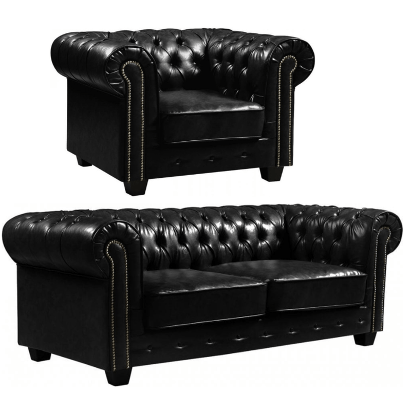 Black leather chesterfield armchair and sofa on a white background