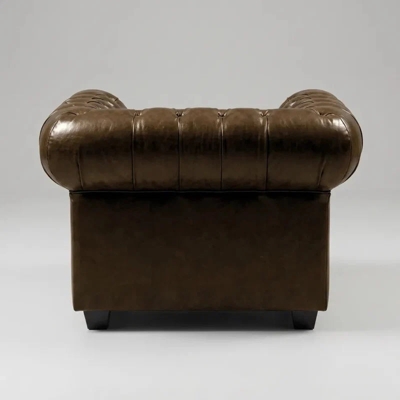 chesterfield-brown-leather-antique-armchair-3-2-1-seater-sofa-set-warm-tone-rich-patina-matching-british-furniture-view-front-side-close-corner-angle-texture-grain-stitched-hand-craftsmanship-timeless