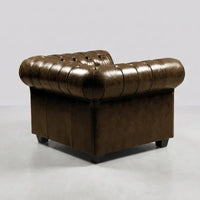 chesterfield-brown-leather-antique-armchair-2-1-seater-sofa-set-padded-seating-durable-warm-tone-rich-patina-matching-british-furniture-view-front-side-close-corner-angle-texture-grain-stitched-hand