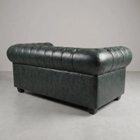 Chesterfield Green Leather Antique 2 seater sofa rear three-quarter studio view on a grey floor