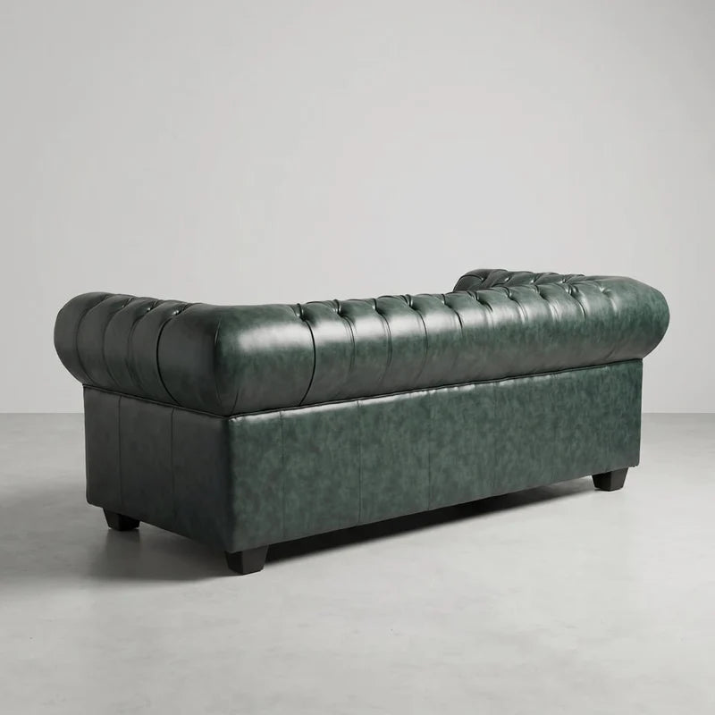 Chesterfield Green Leather Antique 3 seater sofa rear three-quarter studio view on a grey floor