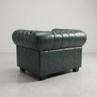 Chesterfield Green Leather Antique armchair rear three-quarter view showing tufted backrest and turned wooden legs