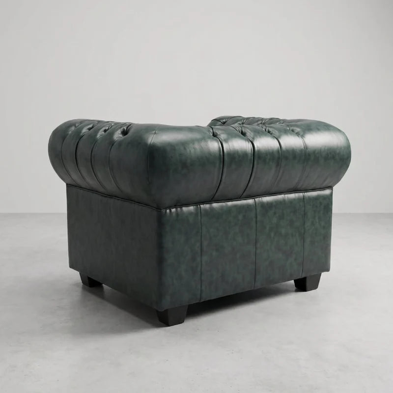 Chesterfield Green Leather Antique armchair rear three-quarter view showing tufted backrest and turned wooden legs
