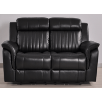 Cidliano 2-seater sofa front-facing in a stylish roomset with contemporary decor and warm ambient lighting.