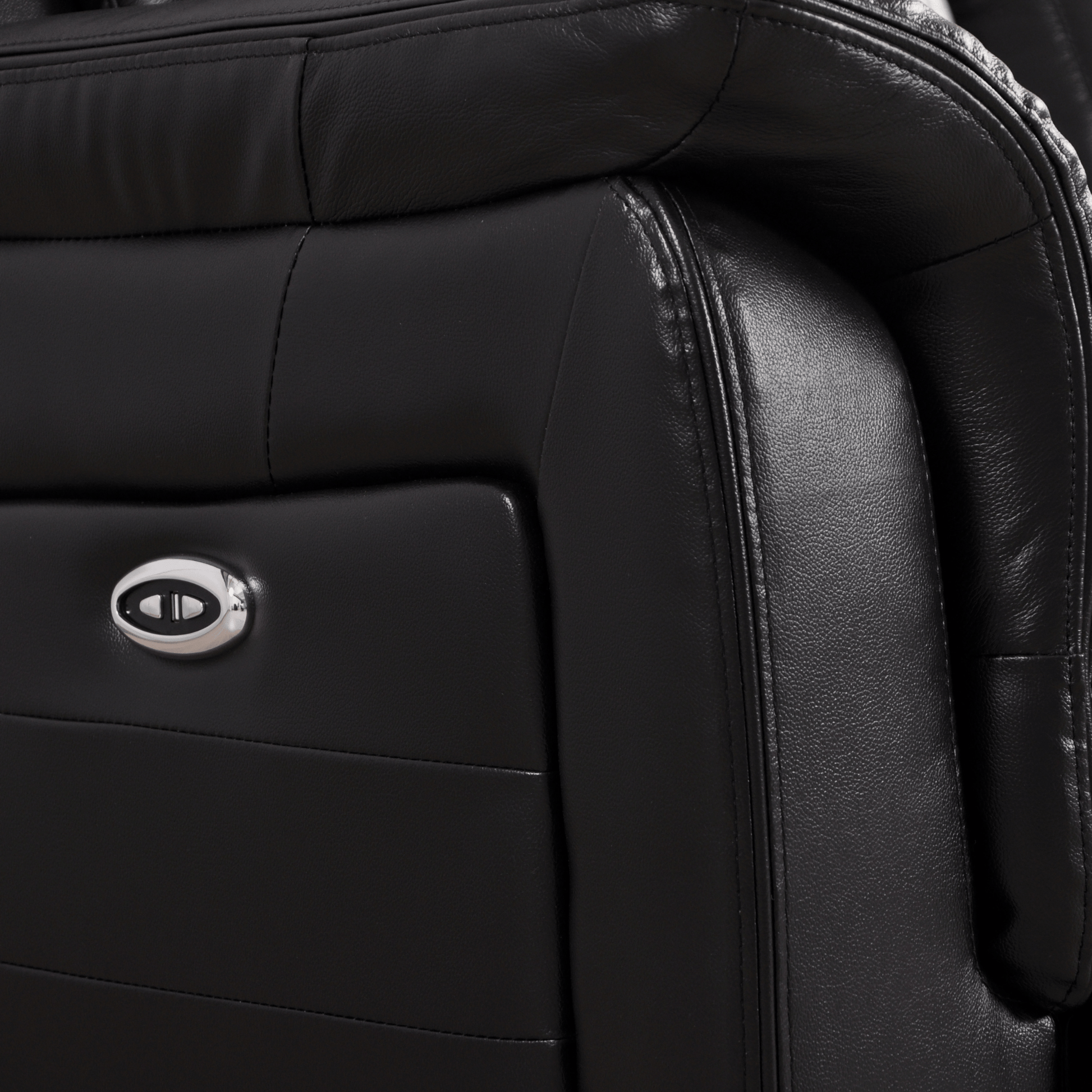 Closeup of Cidliano black 3-seater sofa highlighting fabric texture and stitching details.