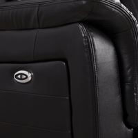 Closeup of Cidliano black 3-seater sofa highlighting fabric texture and stitching details.