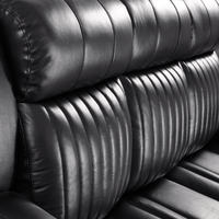 Closeup of Cidliano black 3-seater sofa showing fabric texture and design details.