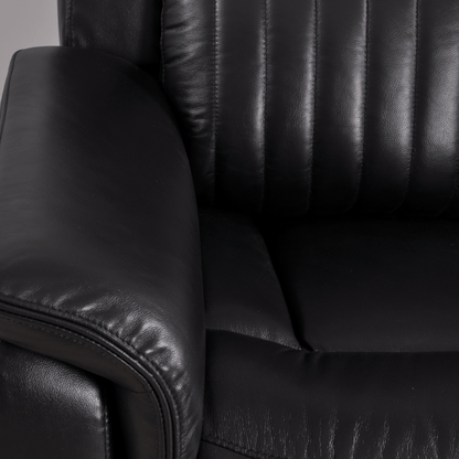 Closeup of Cidliano black armchair highlighting fabric texture and design details on white background.