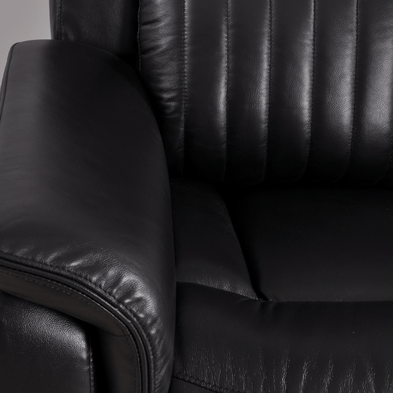 Closeup of Cidliano black armchair highlighting fabric texture and design details on white background.
