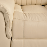 Cidliano Cream 2 Seater – close-up of cream-colored two-seater sofa showing fabric texture and stitching details.