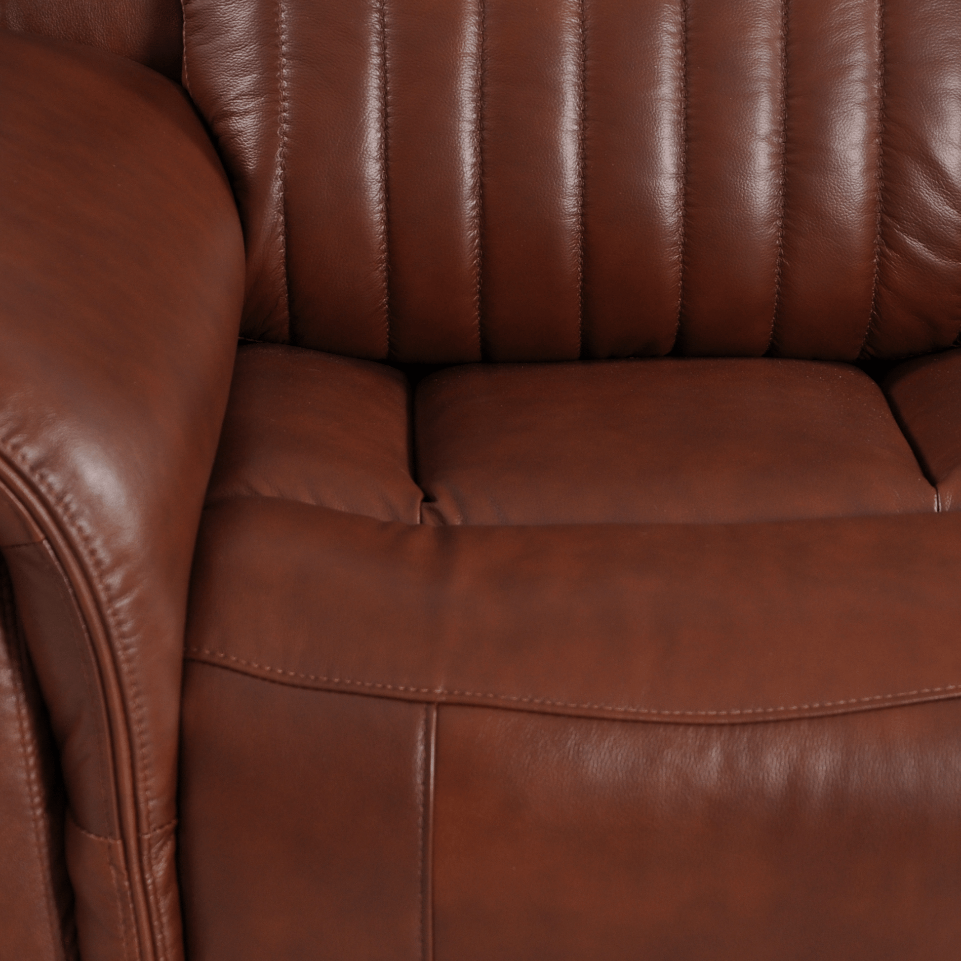 Close-up of Cidliano 3-Seater Tan Sofa highlighting fabric texture and detailed stitching in a modern room setting