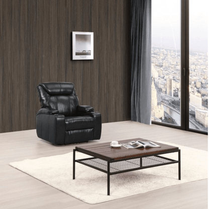 Modern living room with a black leather recliner chair and wooden coffee table.