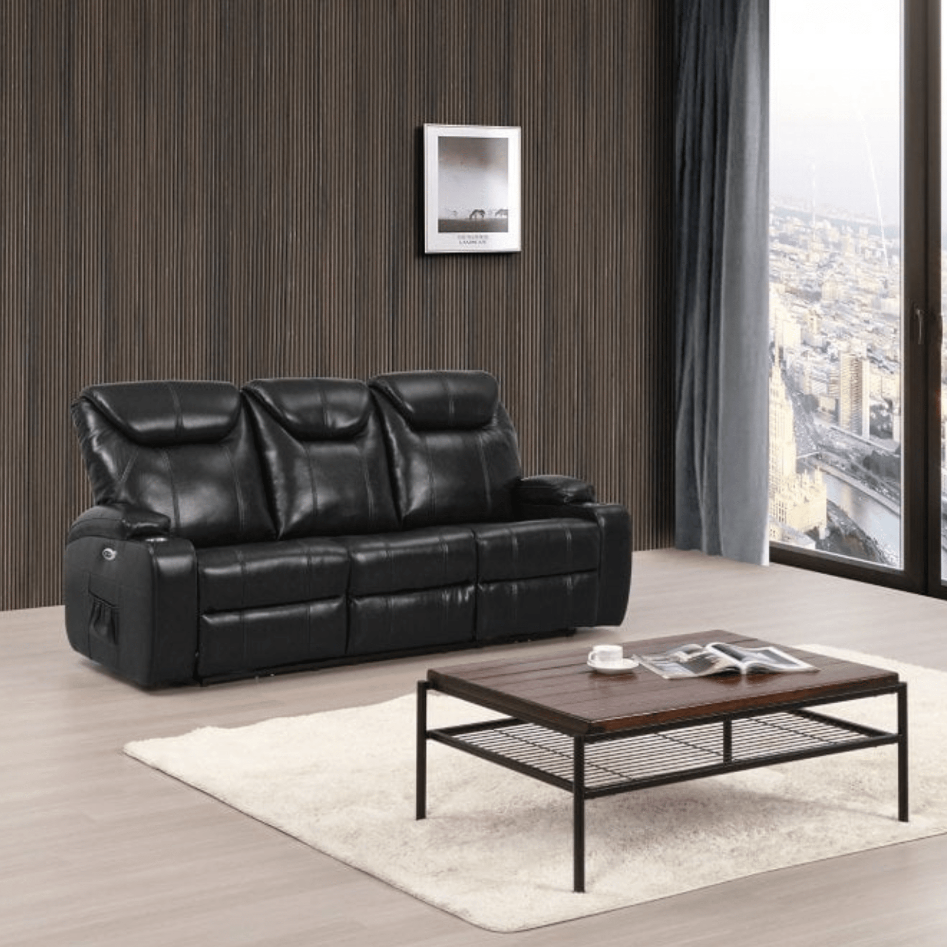 Black leather sofa in a living room with a wooden coffee table and large window.