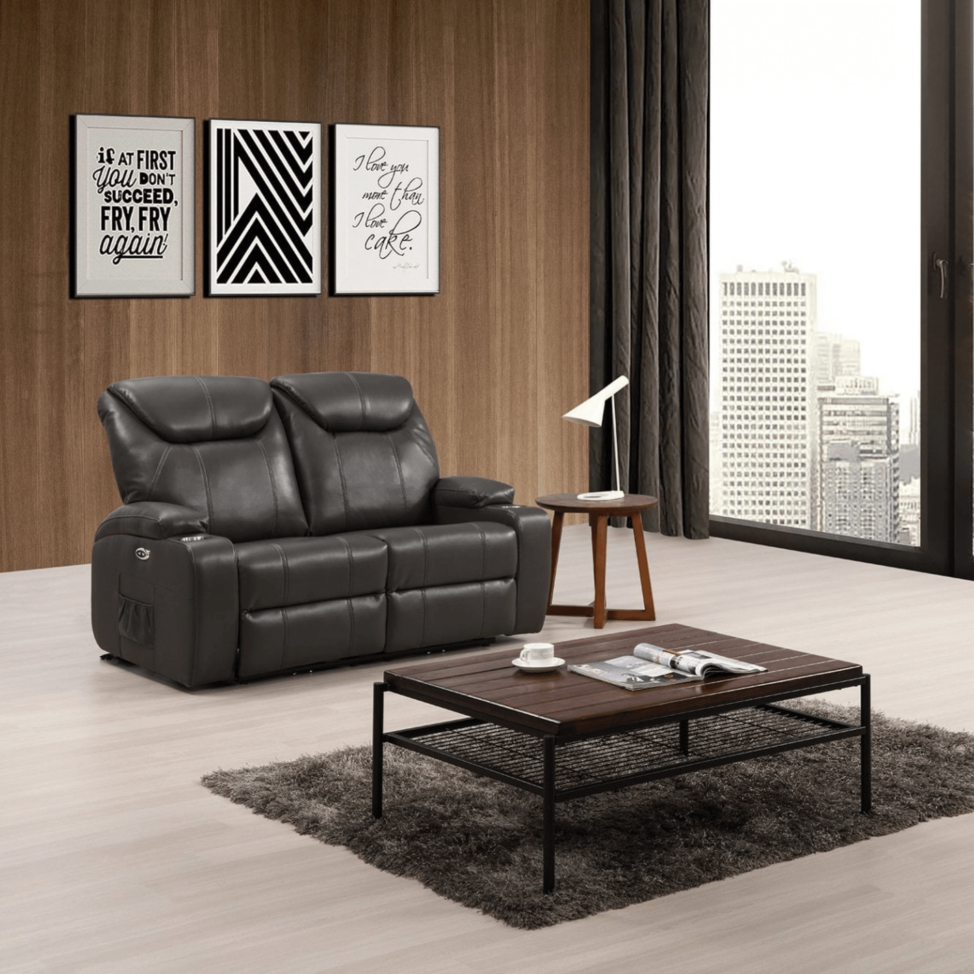 Modern living room with a black leather sofa, wooden coffee table, and wall art.