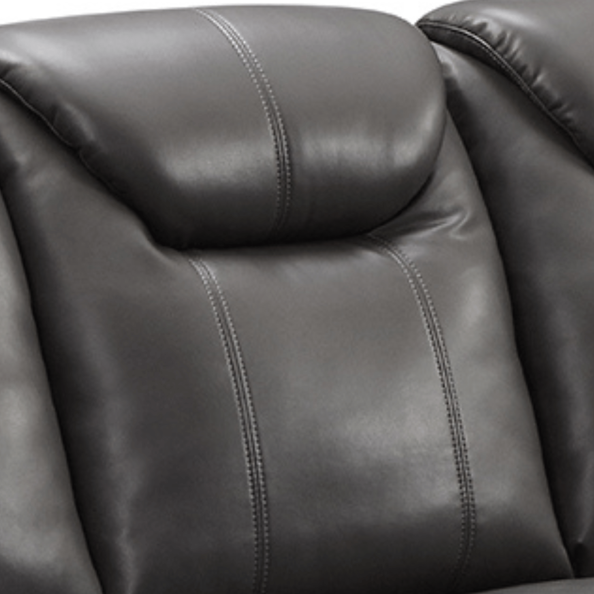 Close-up of a dark brown leather recliner chair