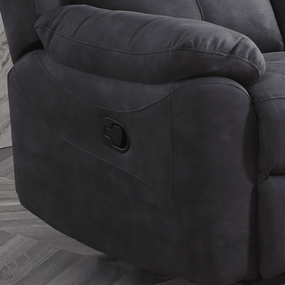 Grey recliner chair with a wooden floor background