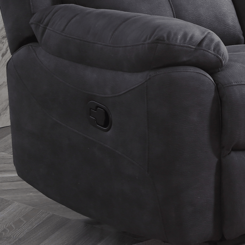 Grey recliner chair with a wooden floor background