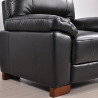 Dalmore Black armchair close-up view in room setting with modern sleek design