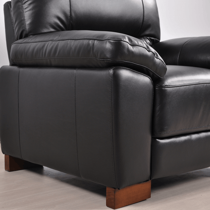 Dalmore Black armchair close-up view in room setting with modern sleek design