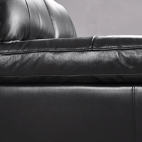 Dalmore Black 2-seater sofa close-up view on white background highlighting fabric texture and sleek design