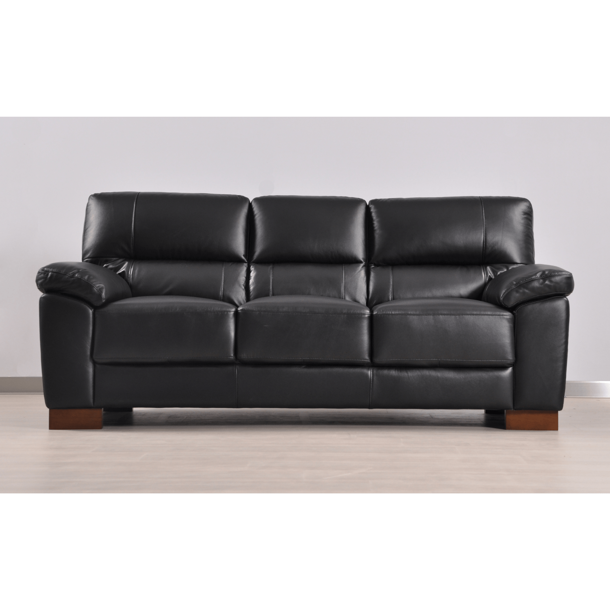 Dalmore Black 3-seater sofa front facing in room setting with modern sleek design