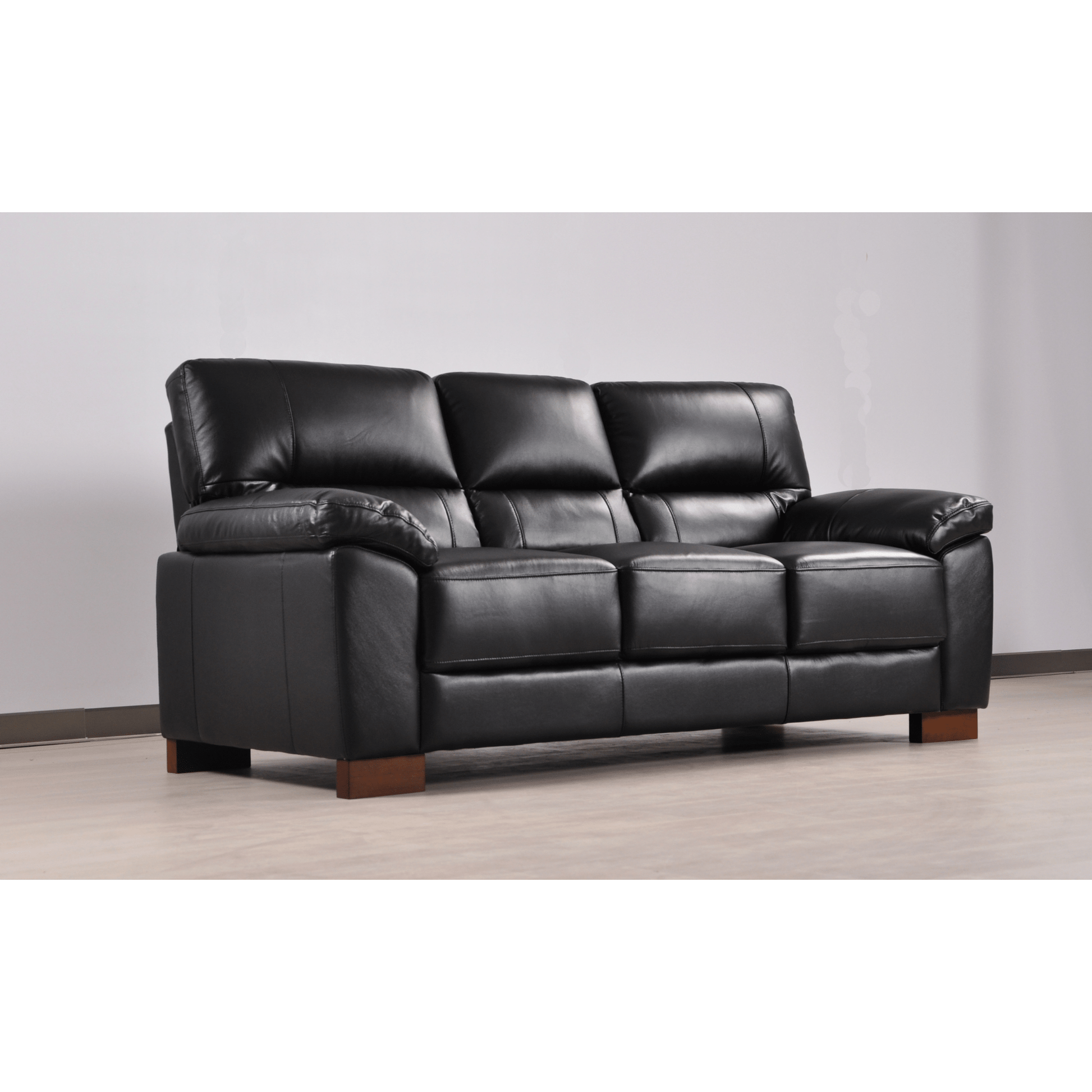 Dalmore Black 3-seater sofa angled view in room setting with modern sleek design