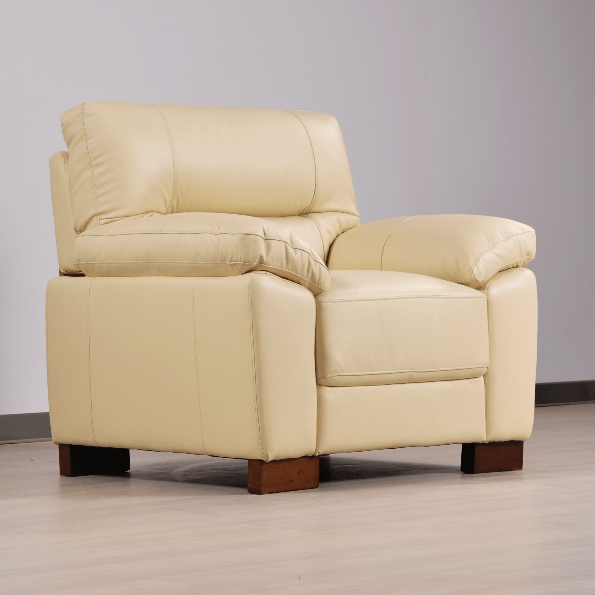Dalmore Cream Armchair – Angled view in a stylish living room setup