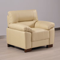 Dalmore Cream Armchair – Angled view in a modern living room setting