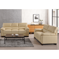 Dalmore Cream 3+2 Seater Sofa Set in Roomset – Cream sofas displayed in a stylish modern living room setting