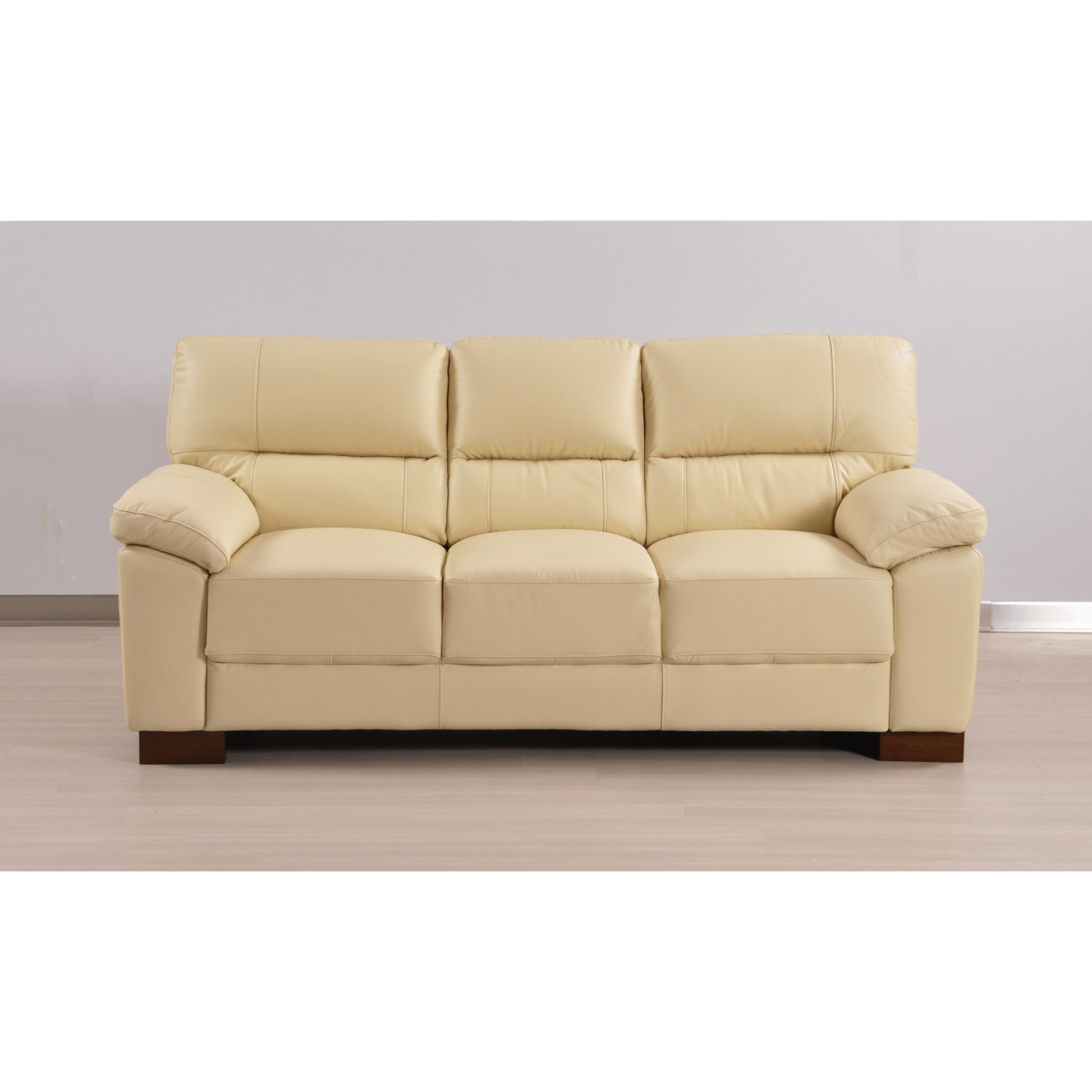 Cream 3-seater sofa front facing in room setting with modern sleek design