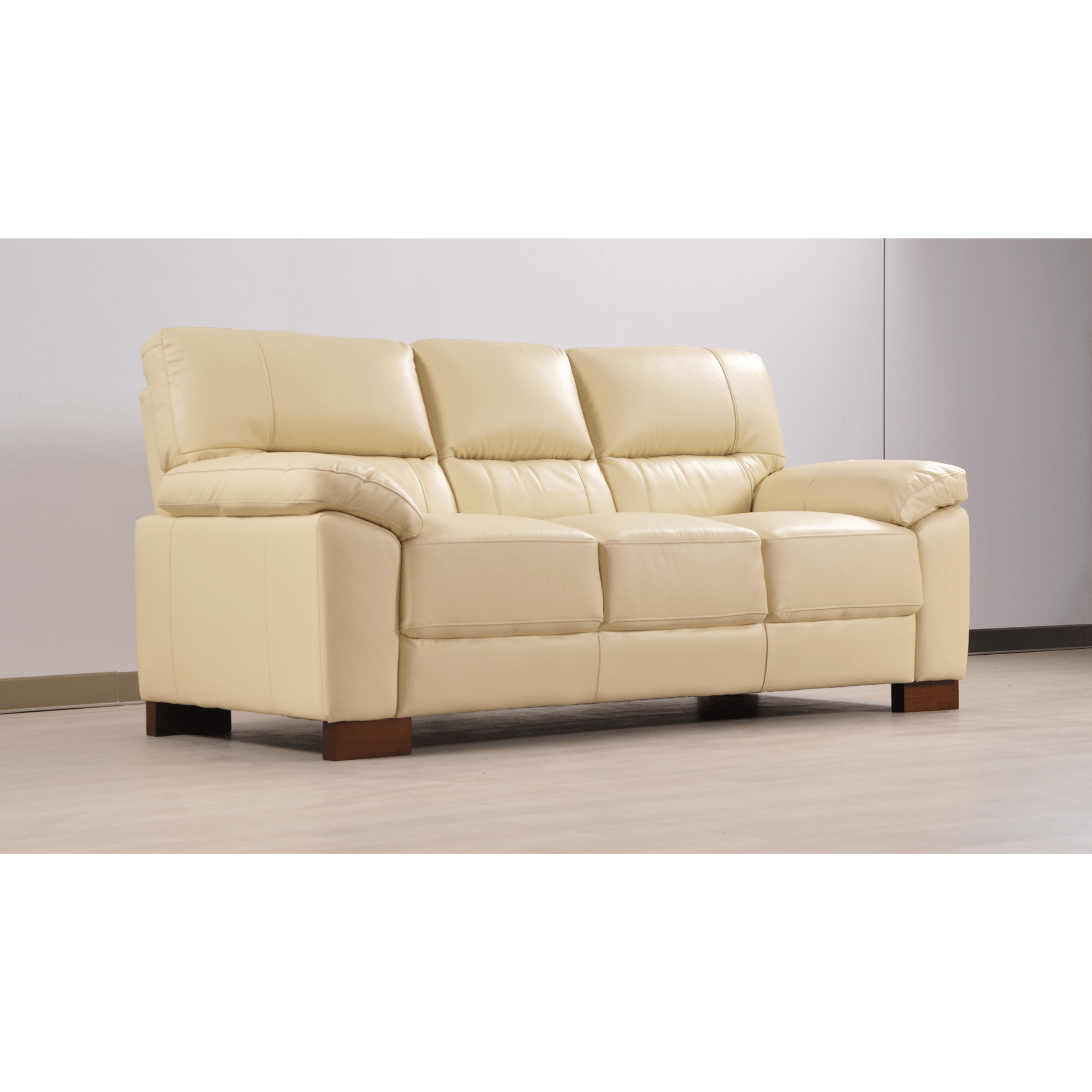 Cream 3-seater sofa angled view in room setting with modern sleek design