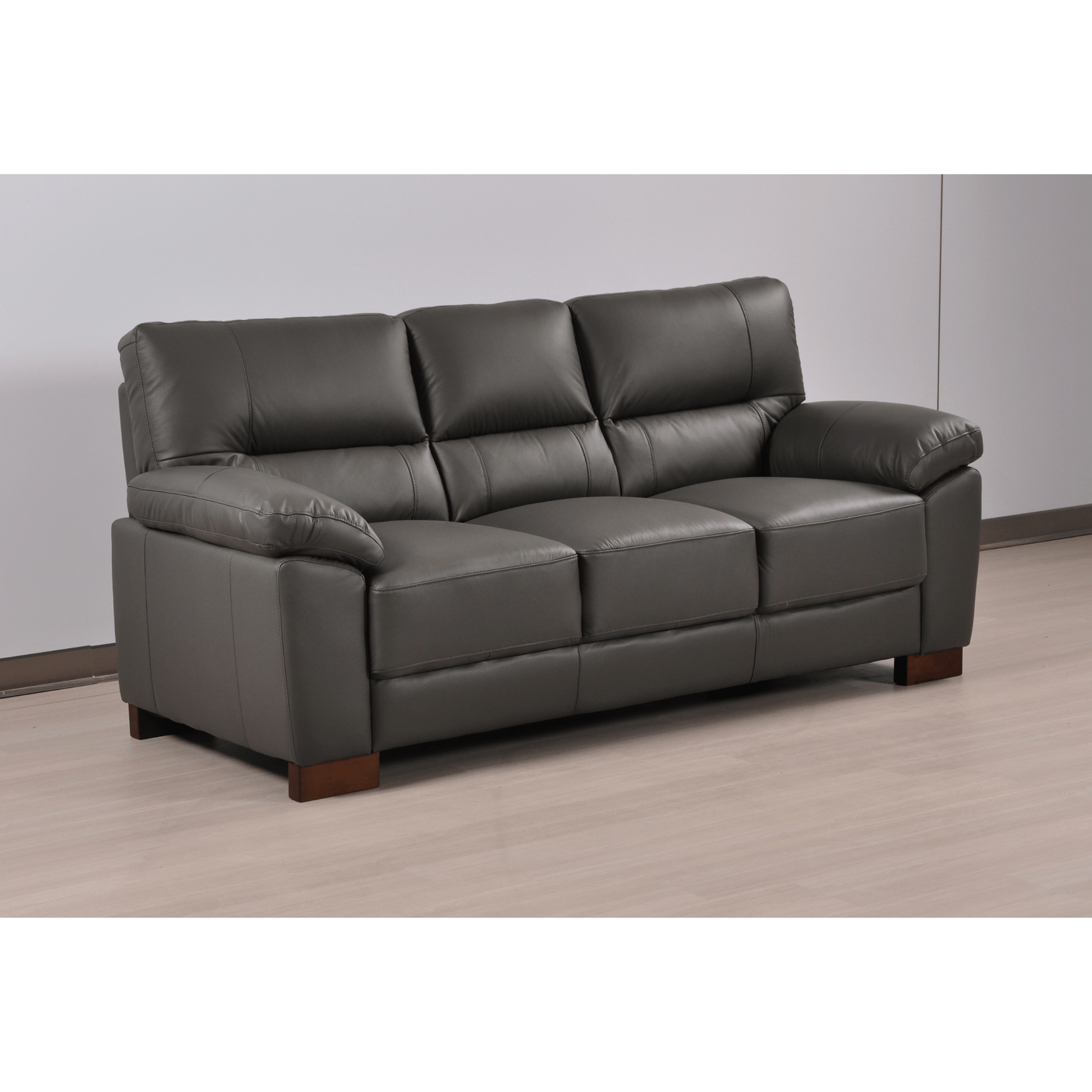 Dalmore Grey 3 Seater Sofa – Angled view in a styled room setting, showcasing plush grey fabric and contemporary design.