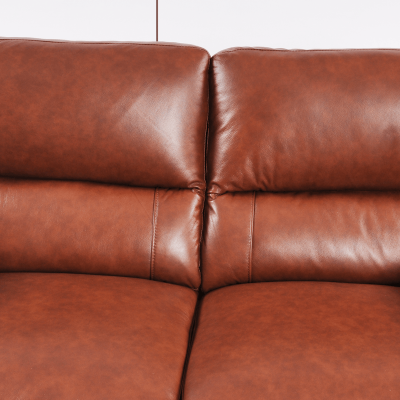 Tan 2-seater sofa close-up view in room setting showcasing fabric texture and modern sleek design