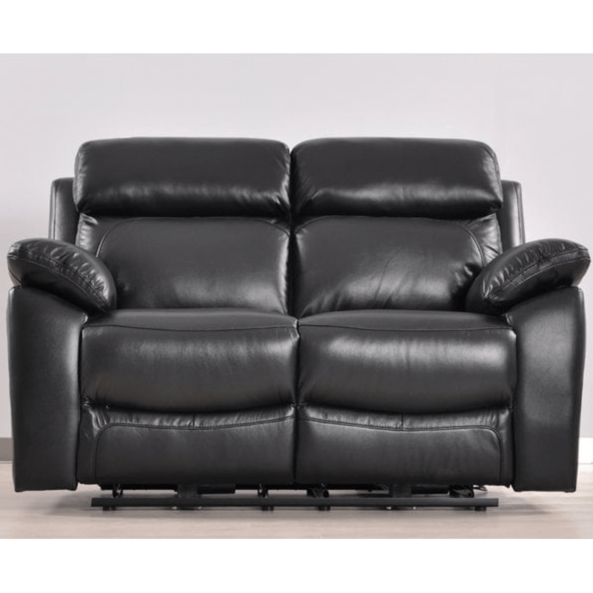 Black leather recliner sofa on a light gray background