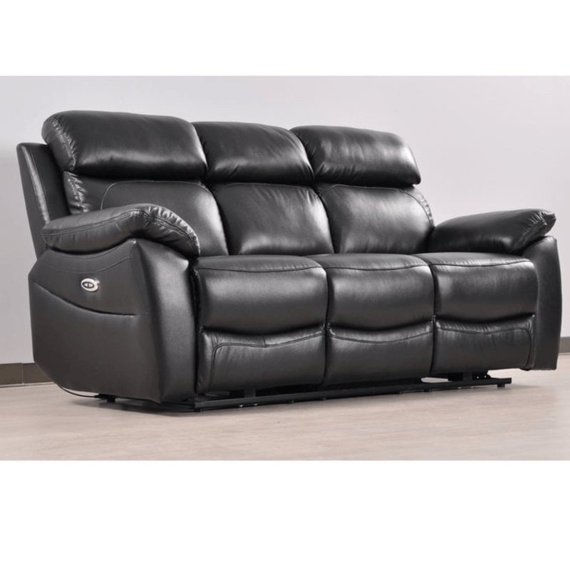 Black leather reclining sofa on a wooden floor with a white wall background