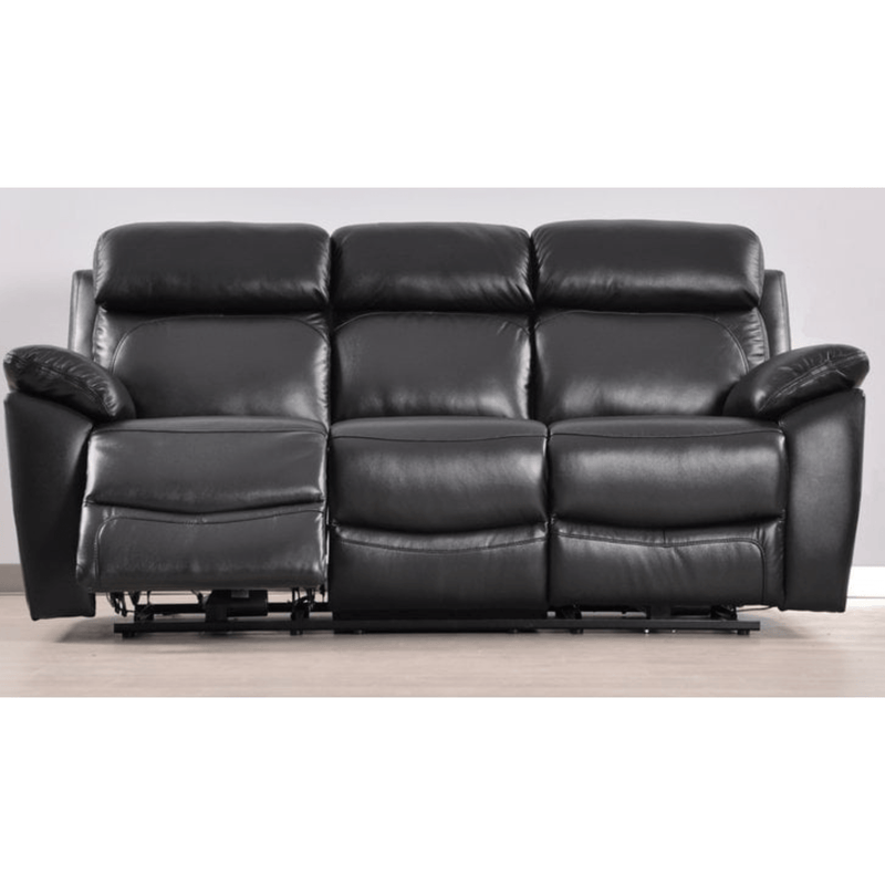 Black leather reclining sofa on a light wooden floor with a white wall background