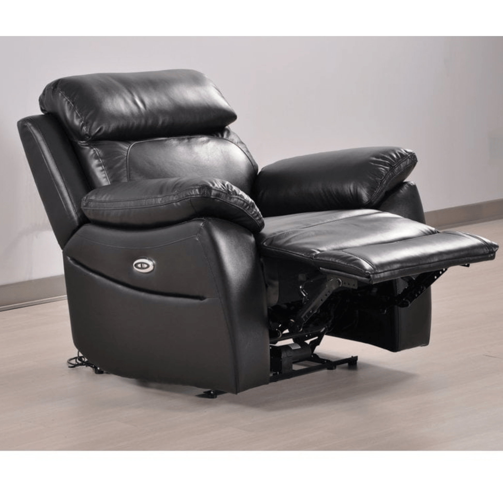 Black leather recliner chair on a wooden floor with a neutral background