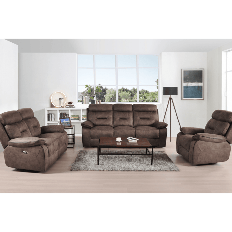 Brown reclining sofa set in a living room with a coffee table and decor items.