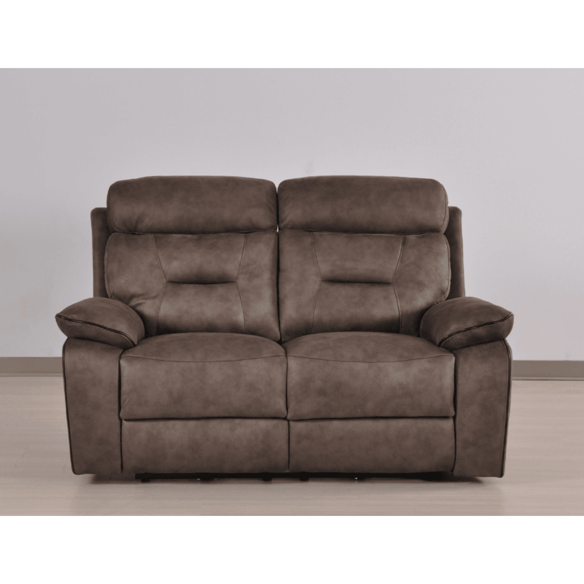Brown leather reclining sofa on a plain background