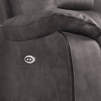 Gray recliner chair with a visible brand logo on the armrest.