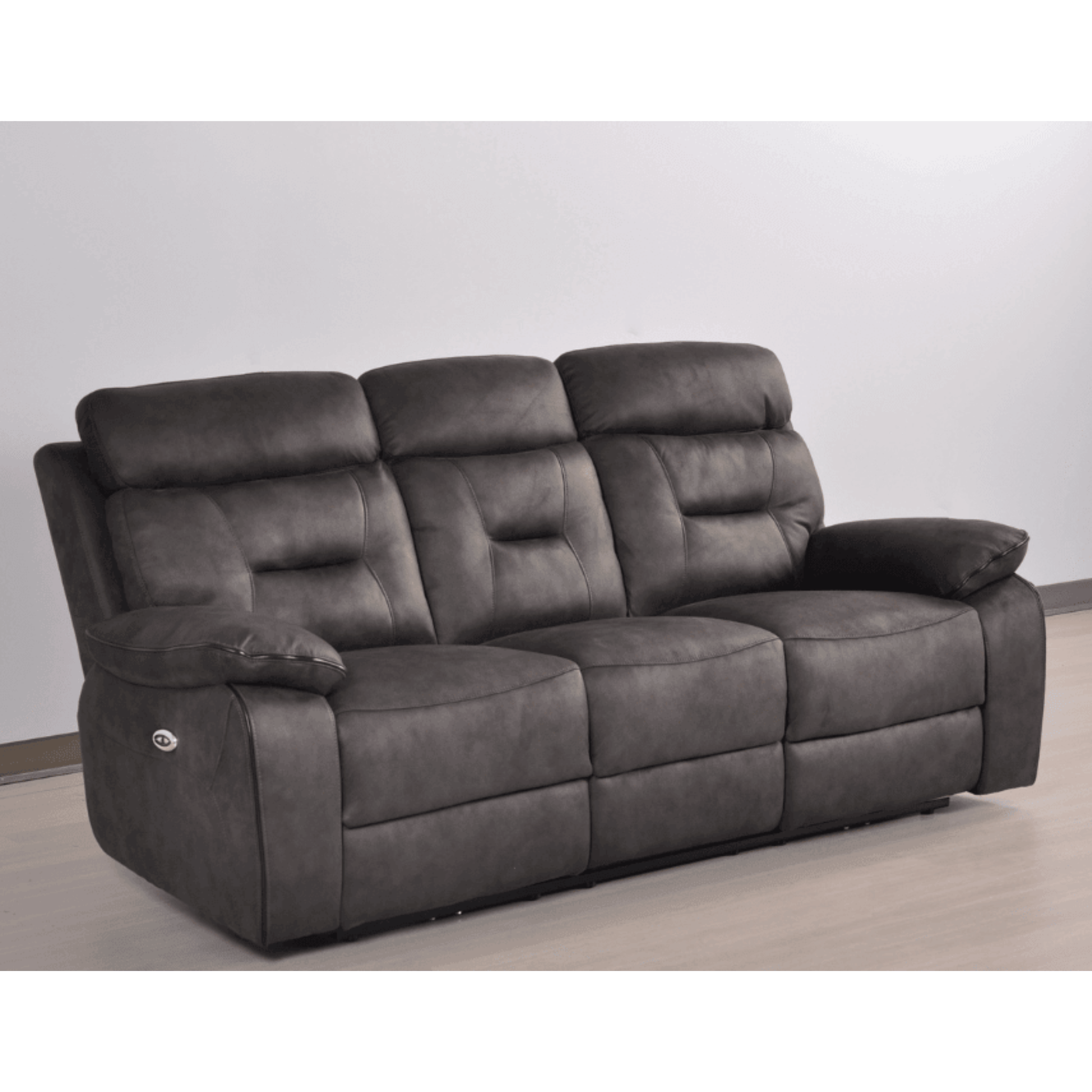Gray sofa with reclining feature on a plain background