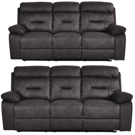 Two dark gray leather recliner sofas on a white background