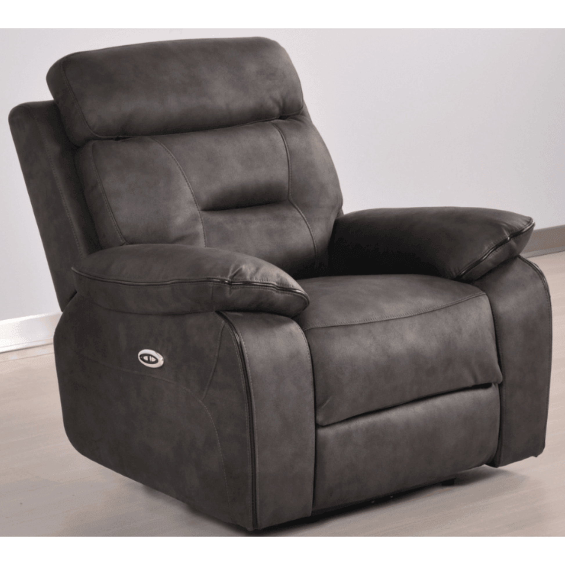 Gray recliner chair on a light wooden floor with a white wall background