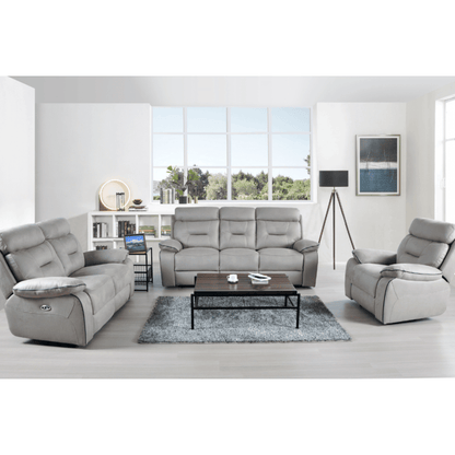 Gray sofa set in a modern living room with a coffee table and decor items.