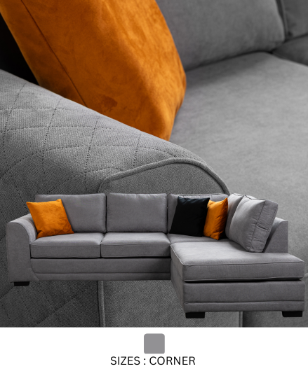 Gray sectional sofa with orange and black cushions on a light gray background