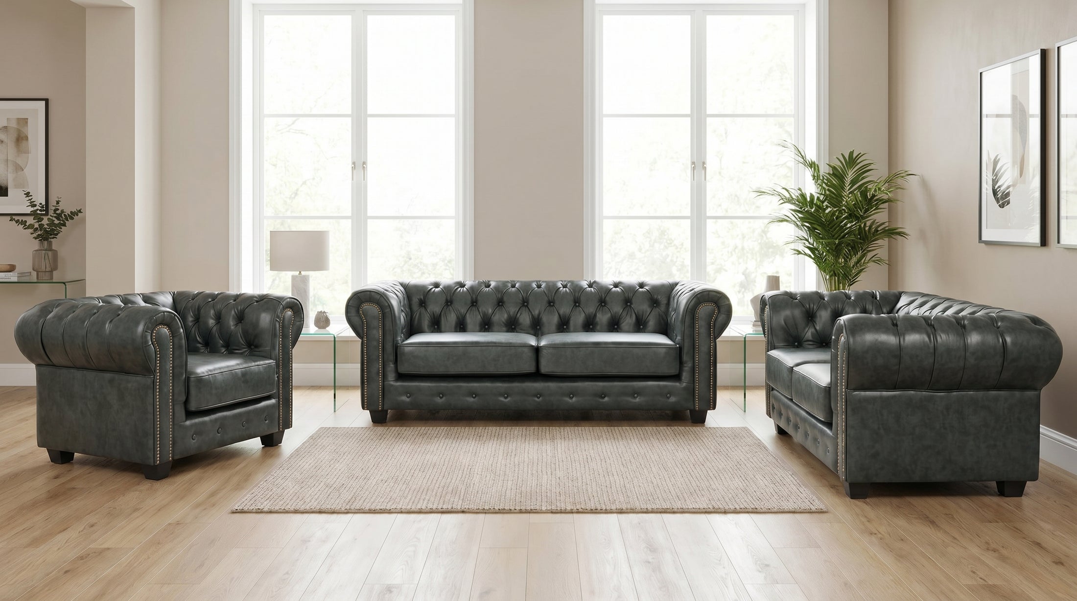 Green Chesterfield leather sofa set styled in a living room