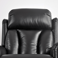 Black leather recliner chair on a white background
