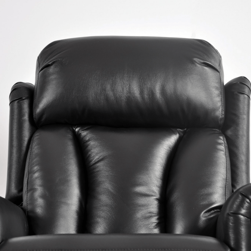 Black leather recliner chair on a white background