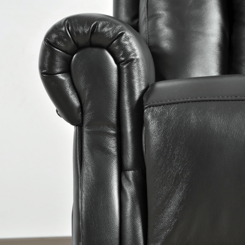 Close-up of a black leather armchair with detailed armrests on a white background