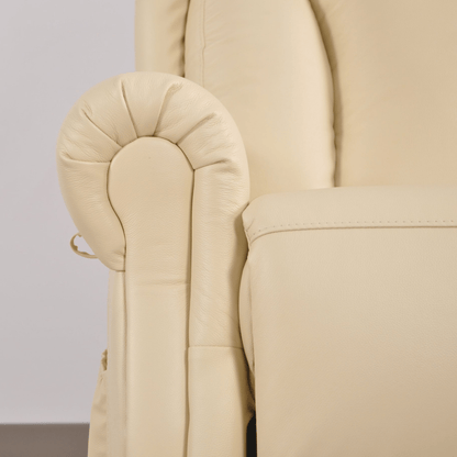 Beige armchair with detailed stitching on a neutral background